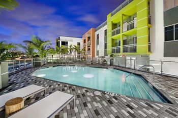Peek-a-boo pool with portholes to the lobby below and a window to the street